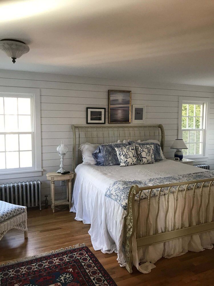 Cozy bedroom with shiplap walls and vintage decor, Bay Road Bath remodel by At Design Remodel, Mashpee