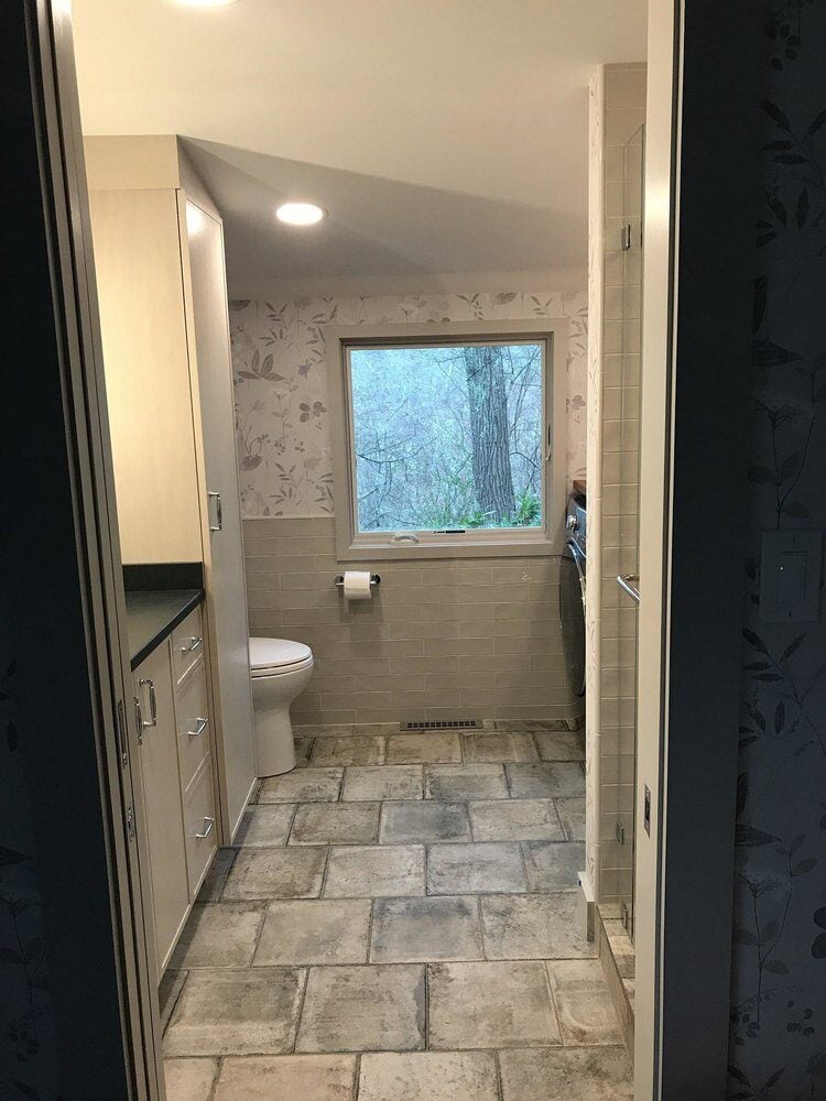 Centerville bathroom remodel featuring a natural light-filled space by At Design Remodel in Mashpee