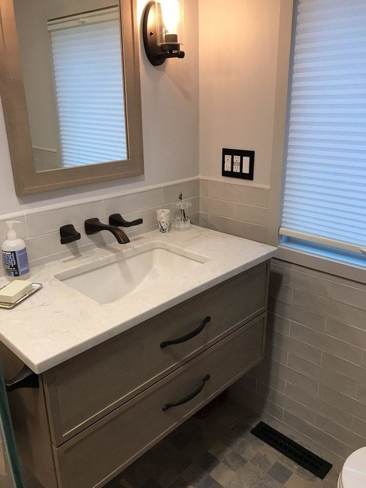 Modern vanity in a Centerville bathroom remodel by At Design Remodel, Mashpee