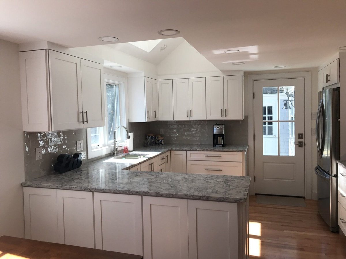 Bright and airy kitchen featuring white cabinets and stainless steel appliances, Centerville Kitchen Remodel by At Design Remodel, M