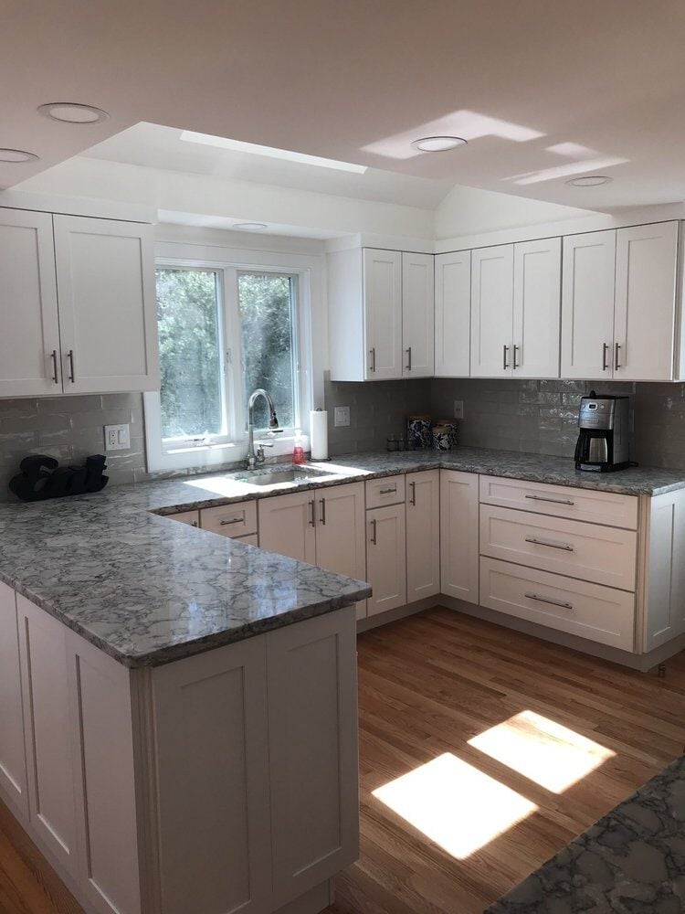 Kitchen with white cabinets, granite countertops, and stainless steel appliances, Centerville Kitchen Remodel by At Design Remodel, 