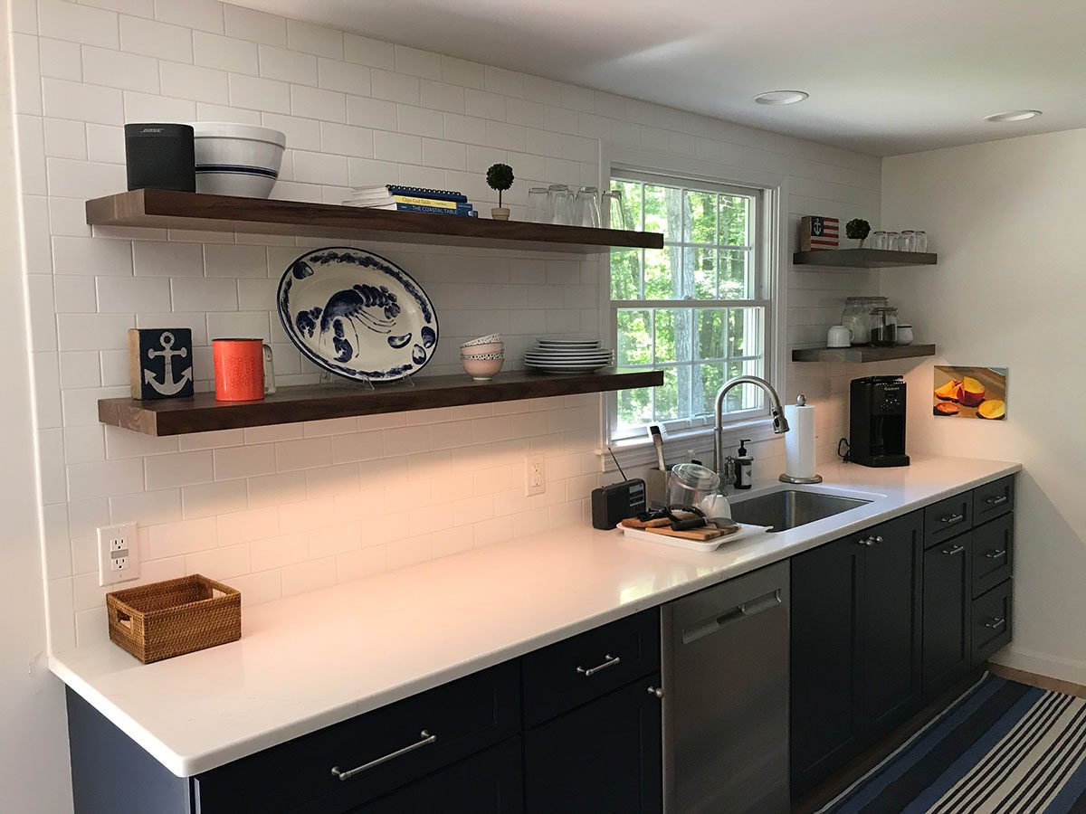 Bright kitchen with open shelving and white countertops, Dennis Kitchen Remodel by At Design Remodel, Mashpee