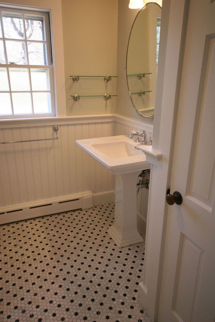 Glass shower door and tiled shower in Pin Oak Bath renovation, Mashpee