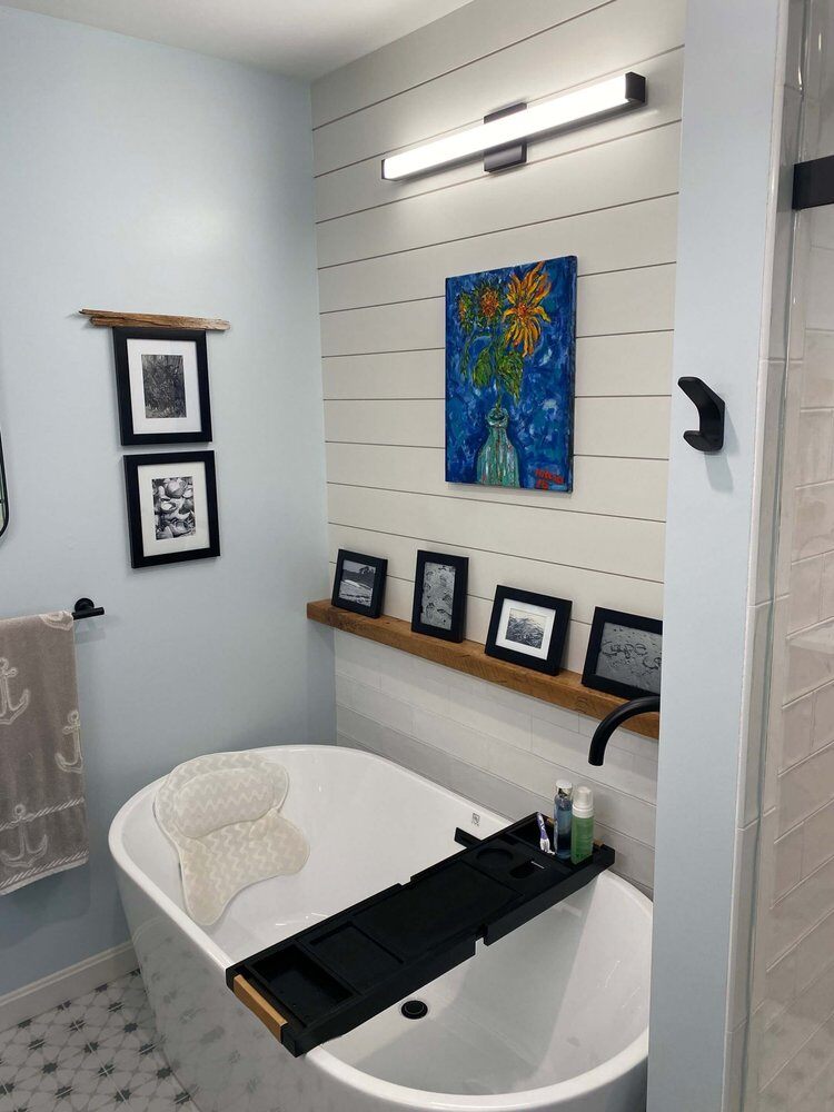 Luxury master bathroom featuring a freestanding tub and shiplap wall, custom remodel by At Design Remodel, Dennis, MA