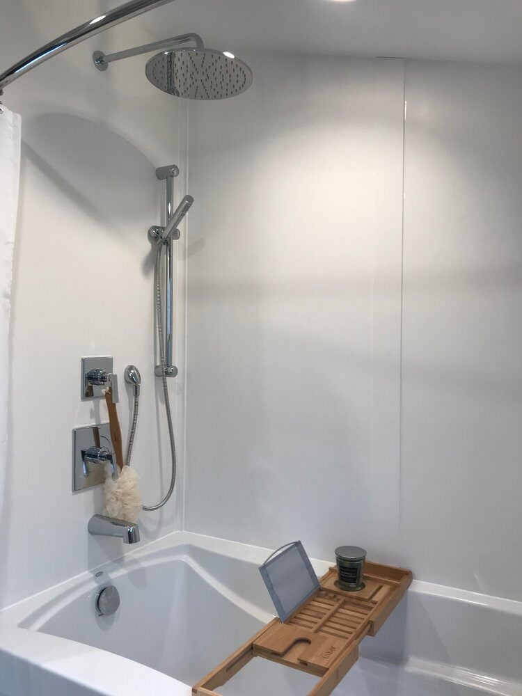 Luxurious shower remodel with rainfall showerhead and bamboo caddy by At Design Remodel, Mashpee, Treasure Lane