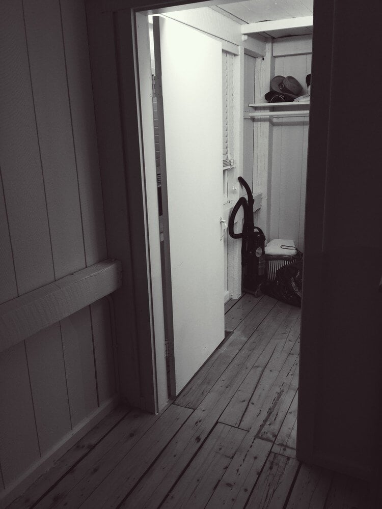 Hallway closet adjacent to remodeled bathroom, Mashpee project by At Design Remodel