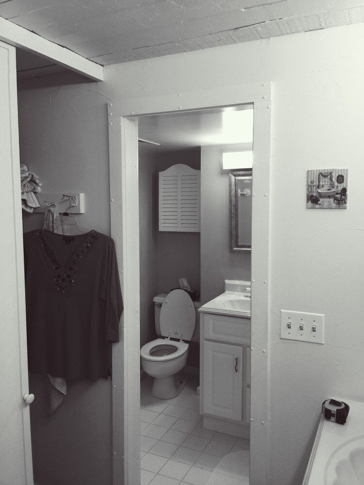 New Seabury bathroom before remodel featuring a small vanity and tiled flooring by At Design Remodel