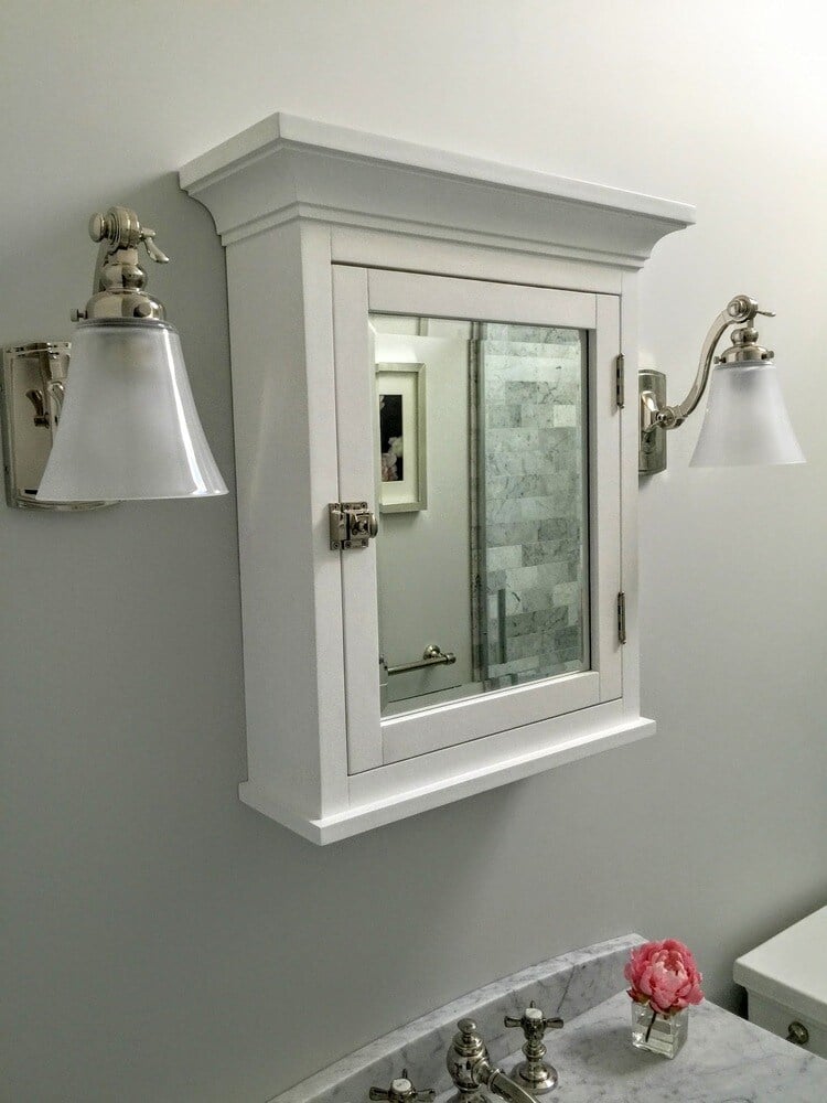 Compact bathroom design featuring a glass-enclosed shower in New Seabury Mews condo, remodeled by At Design Remodel