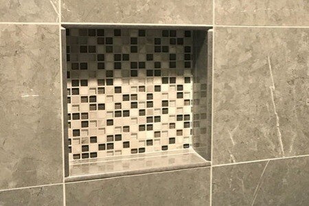 custom tile shower inspiration with mosaic square niche