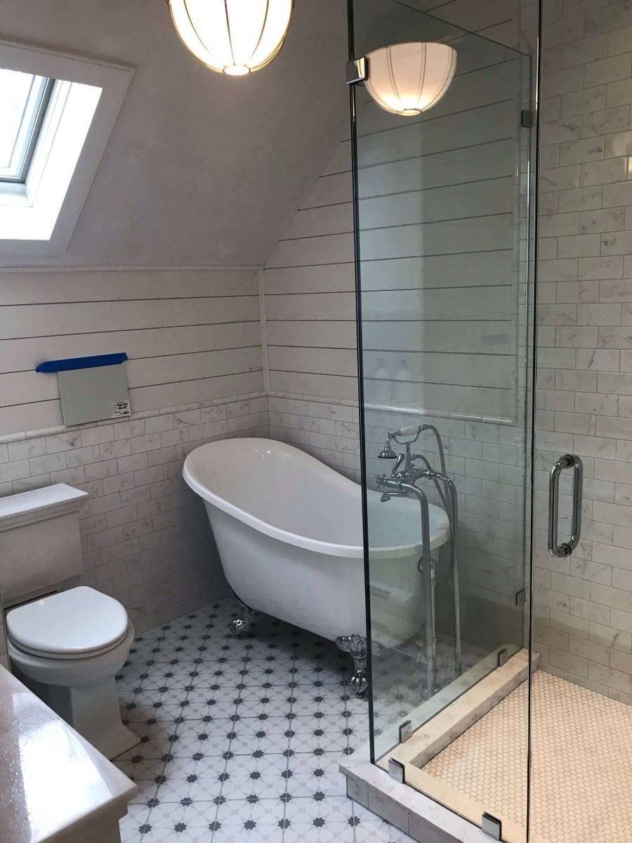 beautiful luxurious bathroom with deep bath in cape cod